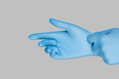 Hands-in-latex-gloves